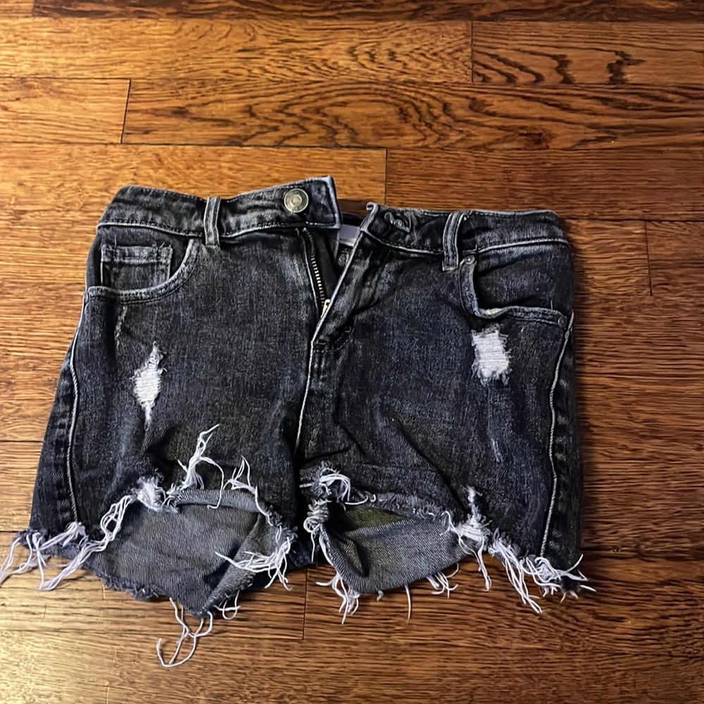 black shorts with fringe on the bottoms